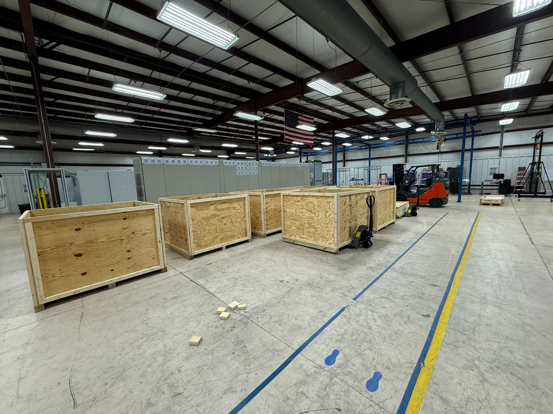 Custom industrial wood shipping crates in a warehouse